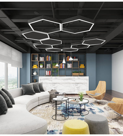Modern hexagonal LED pendant lights in a stylish living room